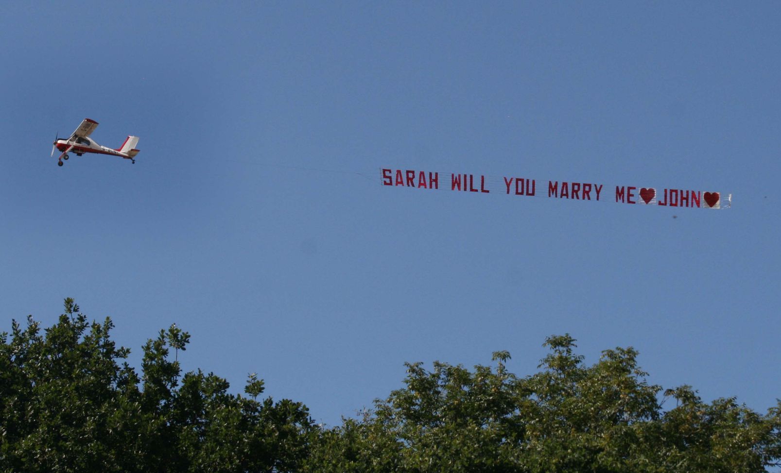 Marrage proposal banner in the sky