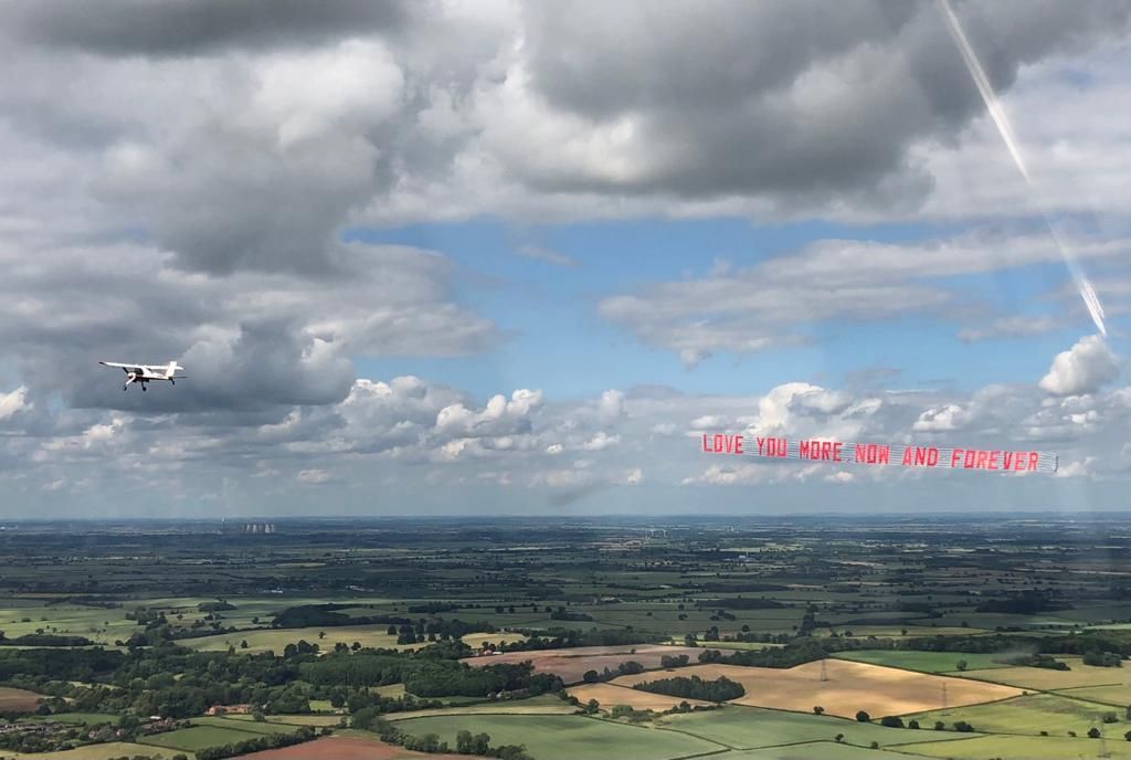Congratulations just married banner in the sky