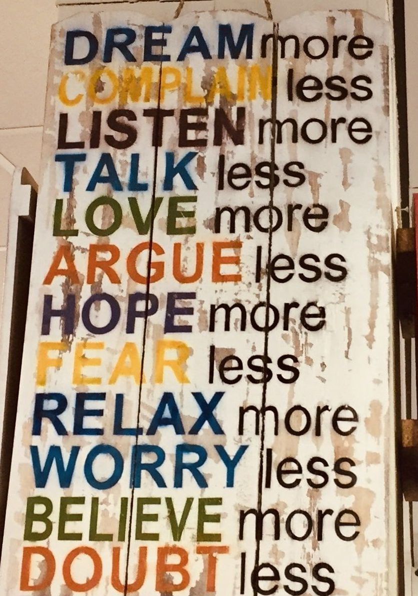 Life Coach & Mental Health Coach in Cologne & Online Board with signature: Dream more, complain less, listen more, talk less love more, argue less