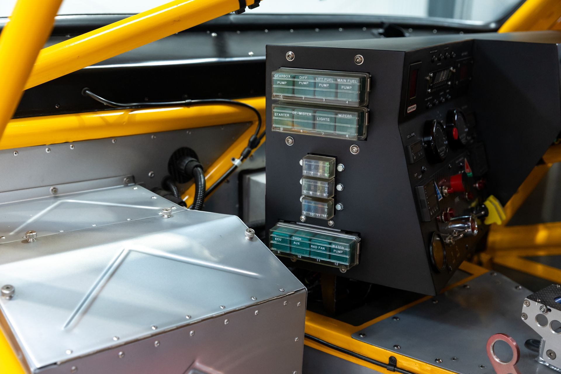 BMW E30 twin-turbo race car in burnt yellow