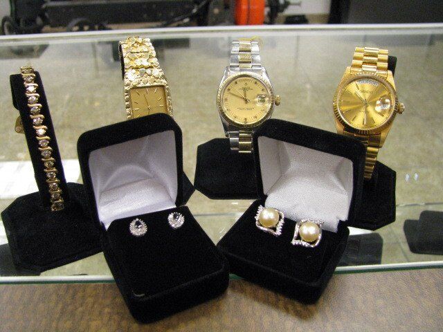 Image of jewelry gold and watches for sale