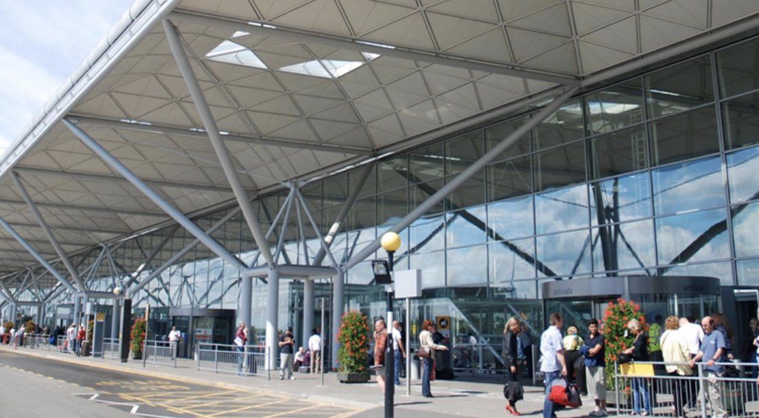 stansted airport terminal main entrance taxi pick up drop off point