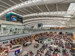looking down inside one of heathrow airports terminals from above