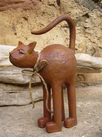 Chat terre patine fer