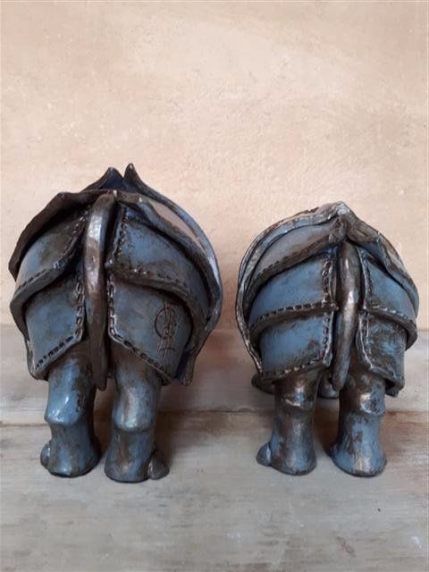 Sculptures de Rhinocéros terre cuite patine métalisée bronze