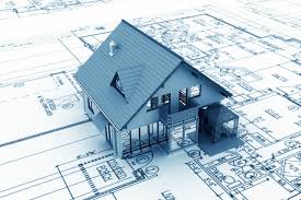 Architectural model house on building plans
