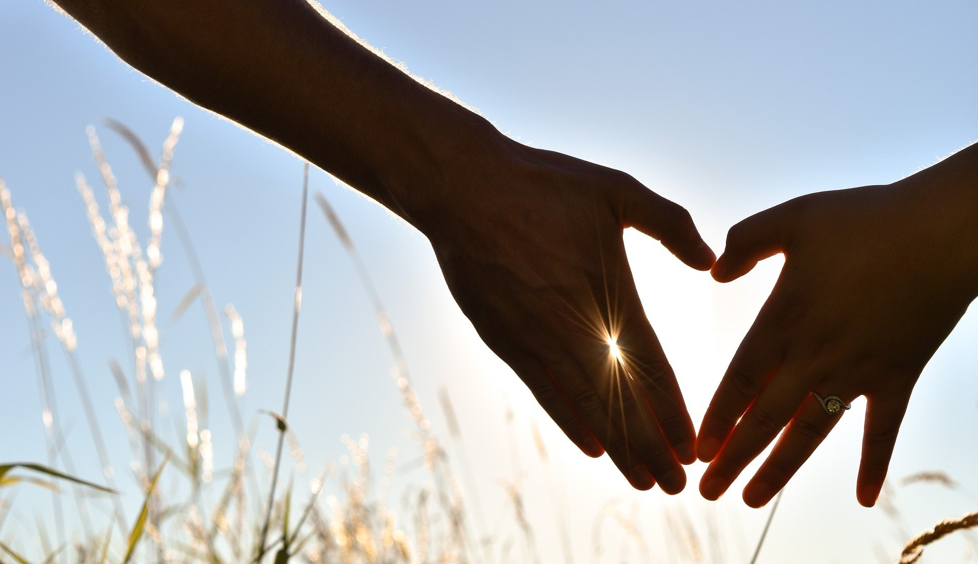 Engaged couple hands prenuptial agreement Amanda Vermeulen solicitor