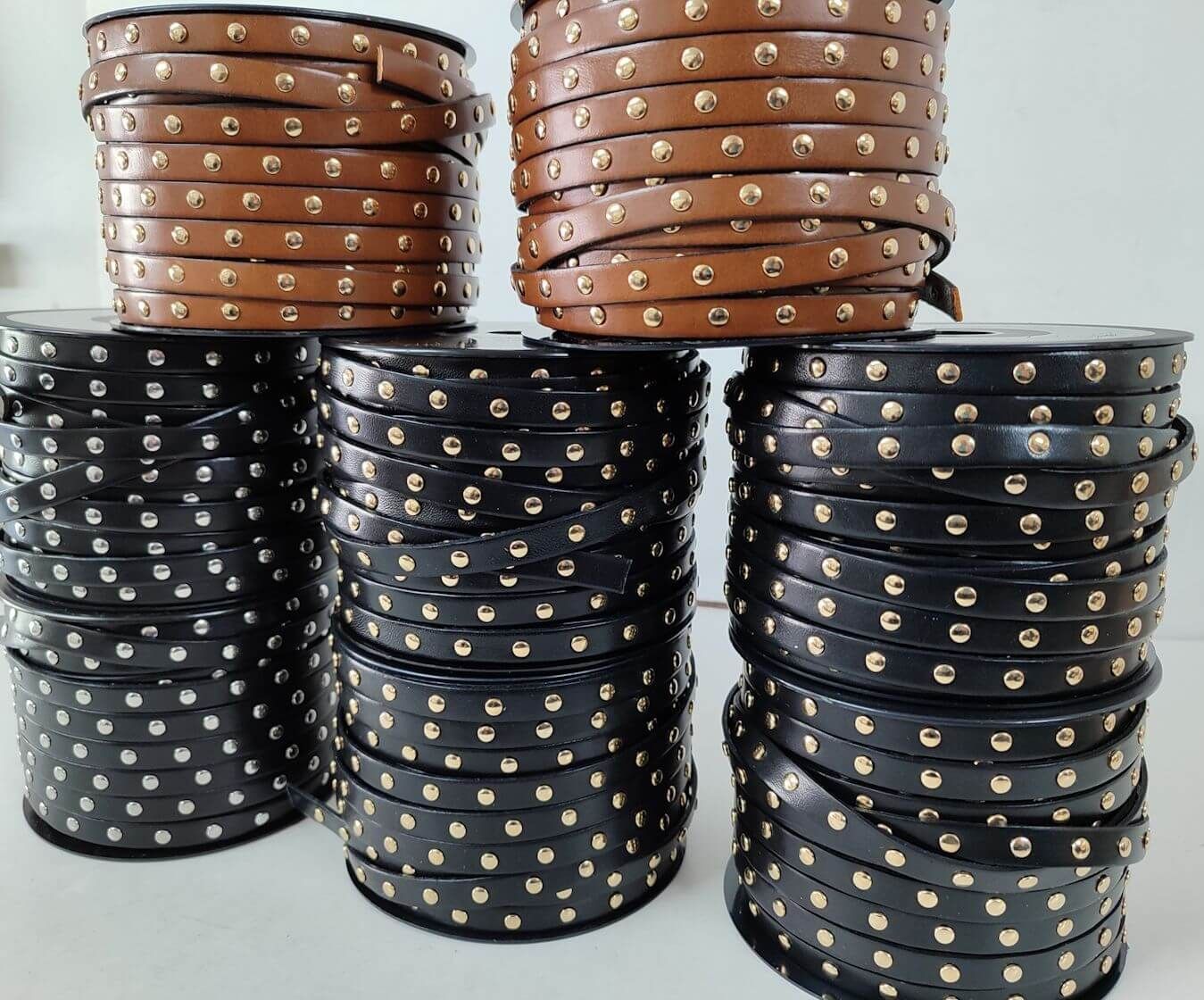 Riveted flat leather strip