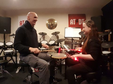 Andy giving a drum lesson