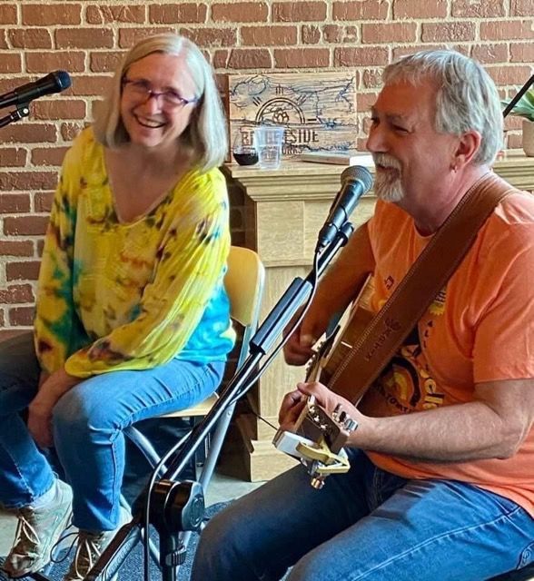 Jodi and Dewey perform with smiles