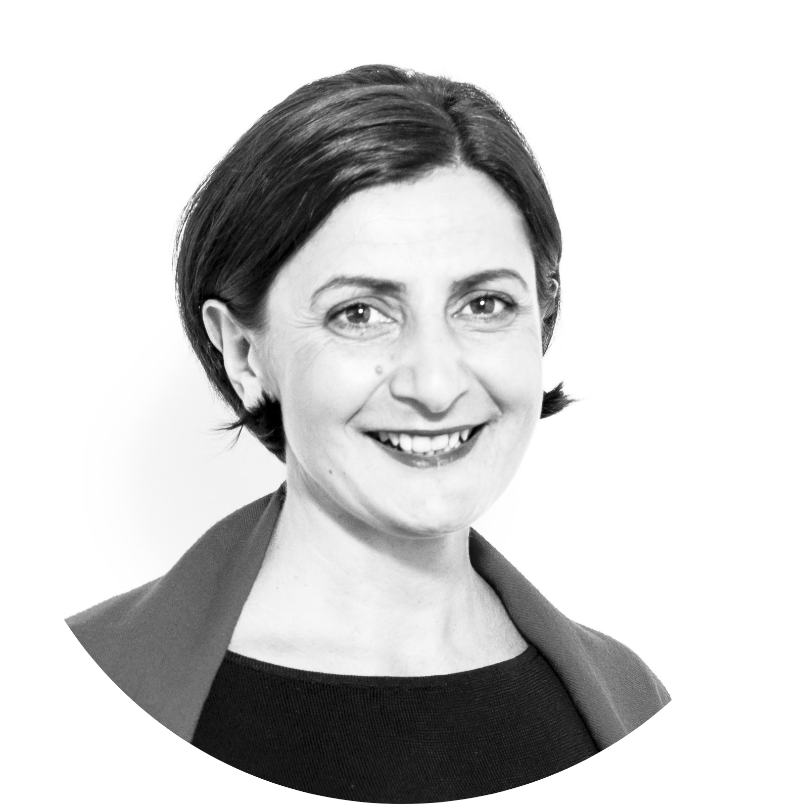 Black and white headshot of Agnes smiling, with cropped dark hair.