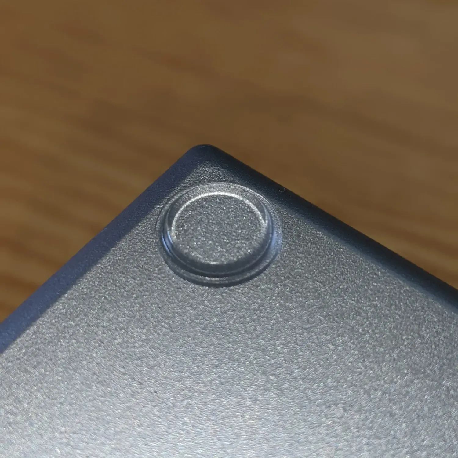 Flat topped rubber foot applied to the base of an electronic item