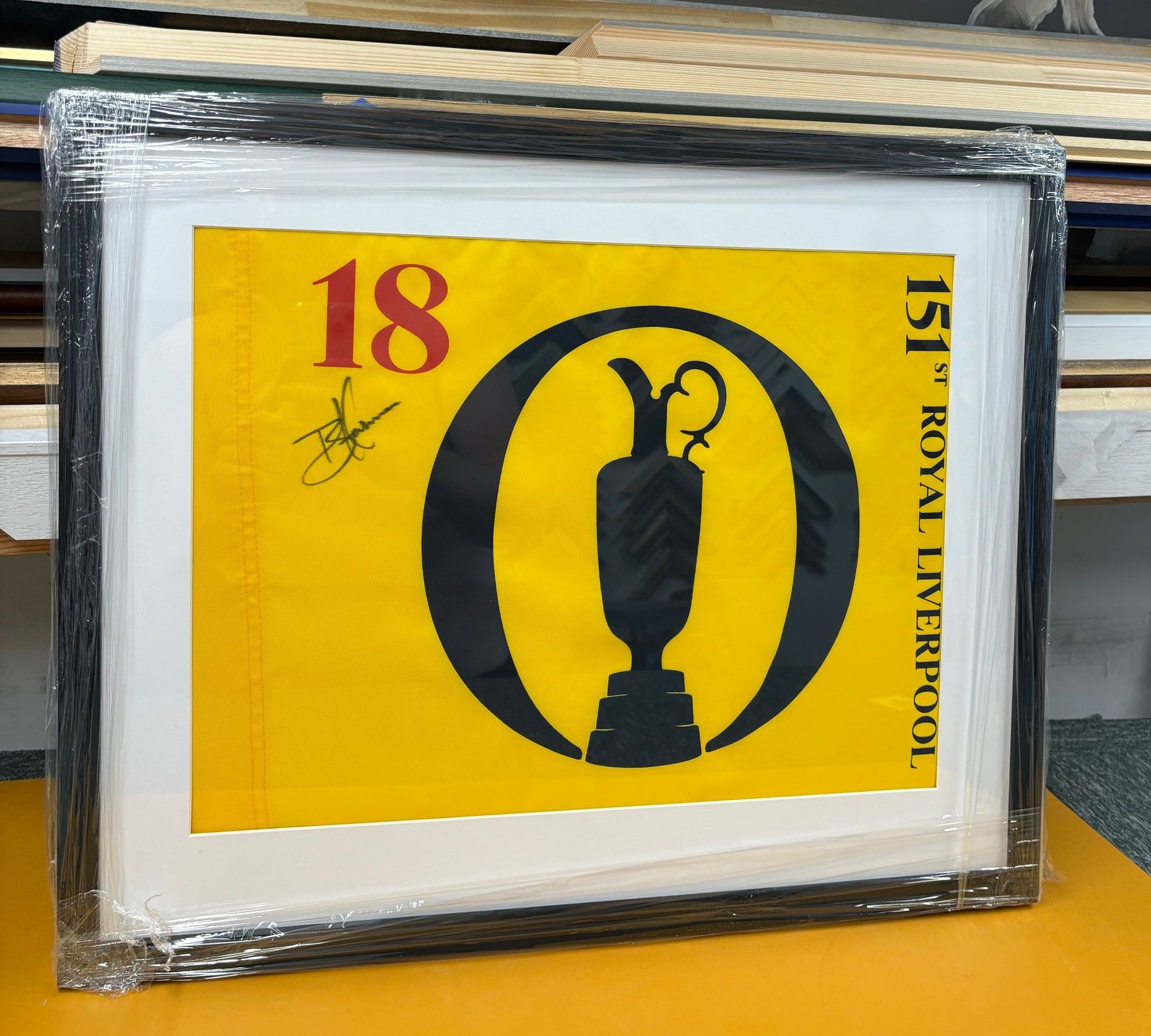 A framed northampton saints rugby shirt
