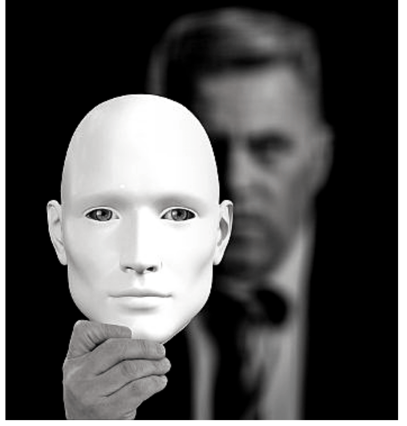 Picture of a man holding a mask to represent Imposter Syndrome