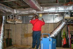 American Environmental CEO helping his employees