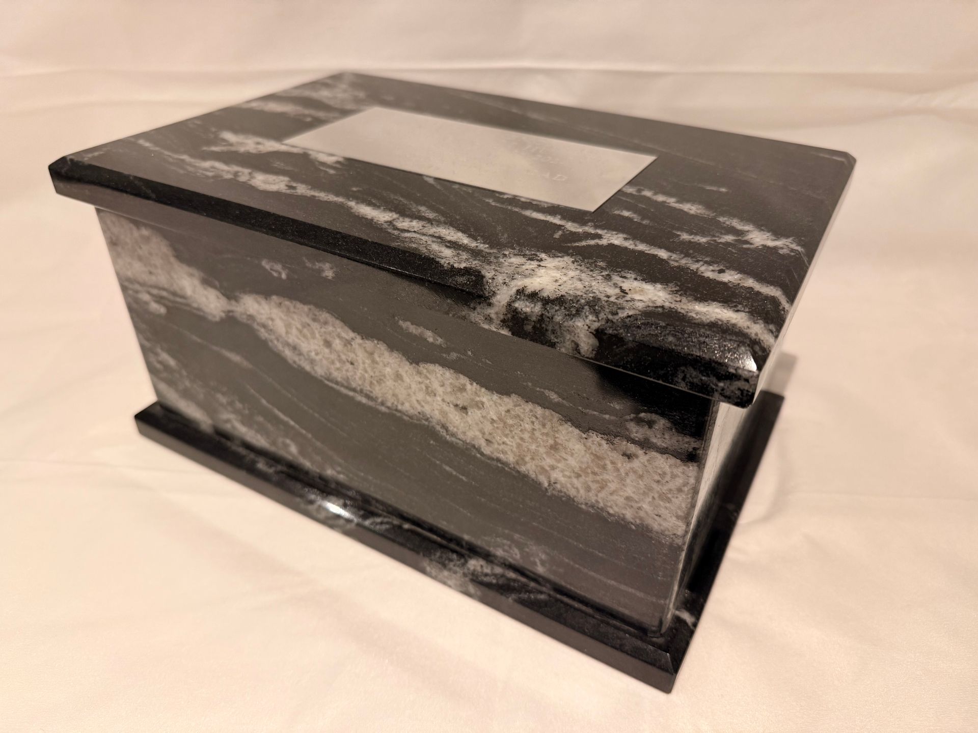 Solid black marble ashes urn