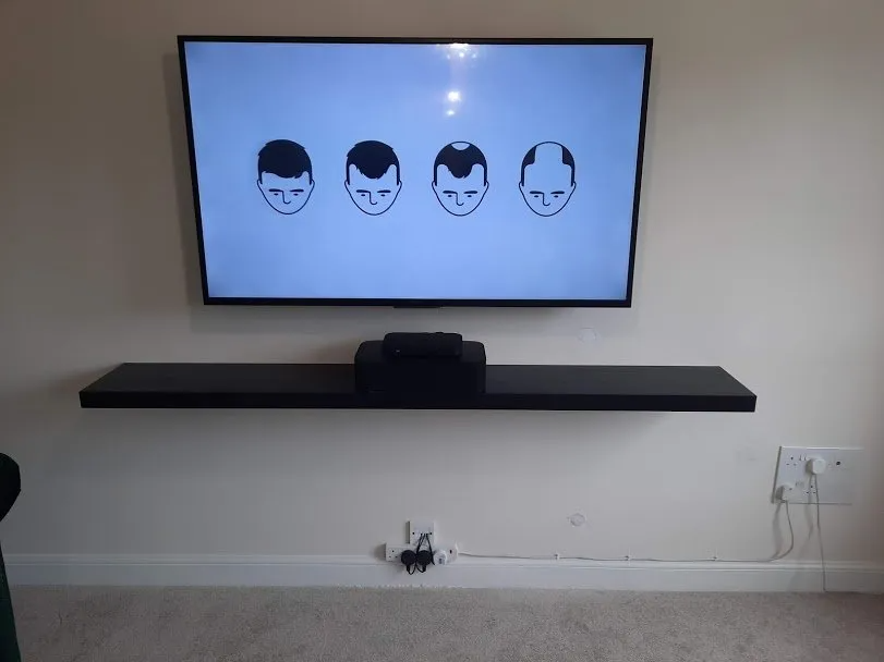 TV + floating shelf wall mounted