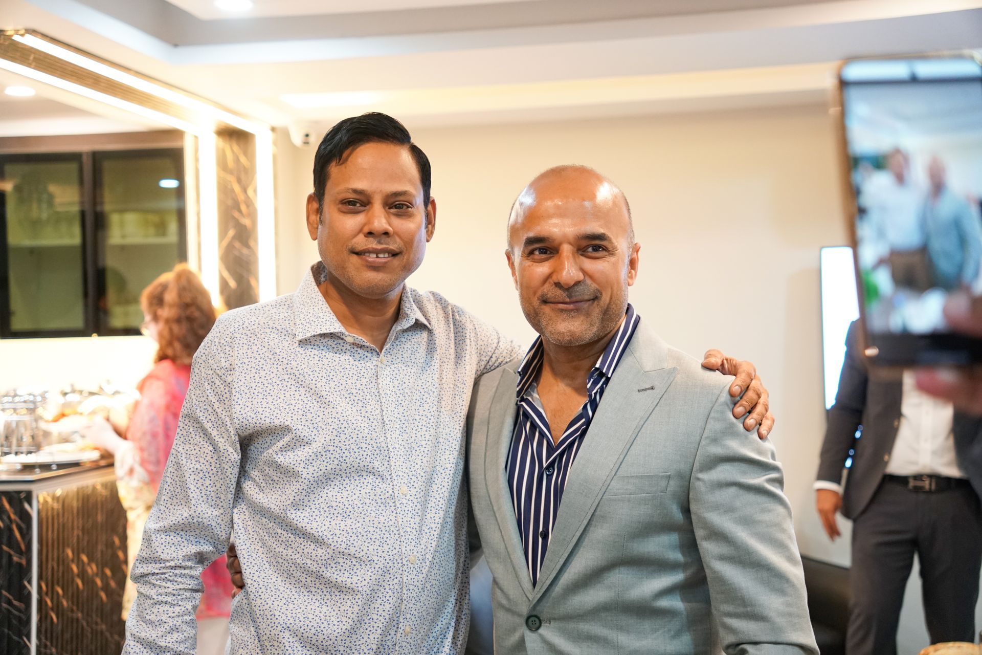 Managing Director Mr. Syed Ali Hasnain Rizvi with an employee