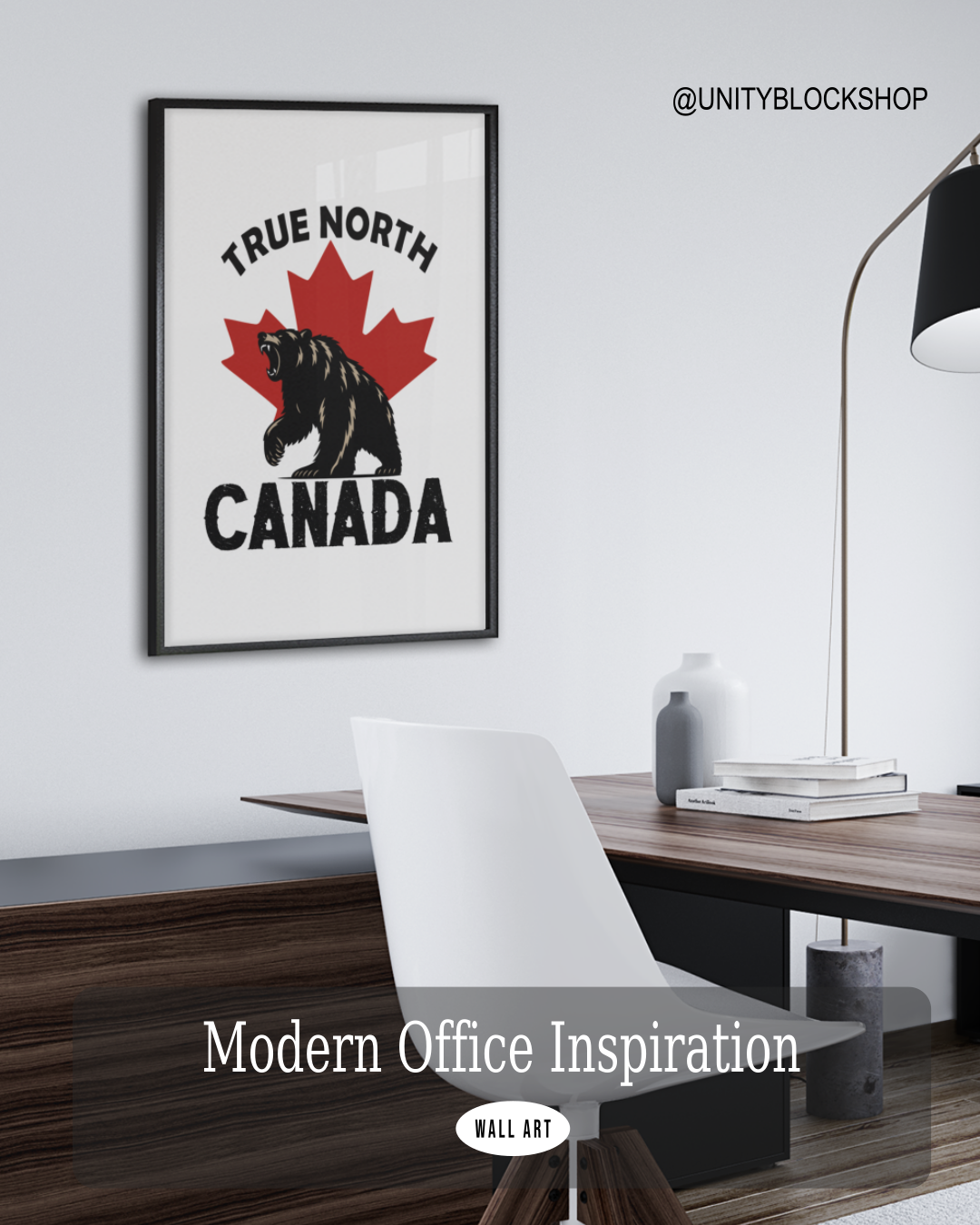 Modern office setup featuring Unity Block’s True North Canada bear wall art framed on the wall, styled in a clean minimalist workspace.