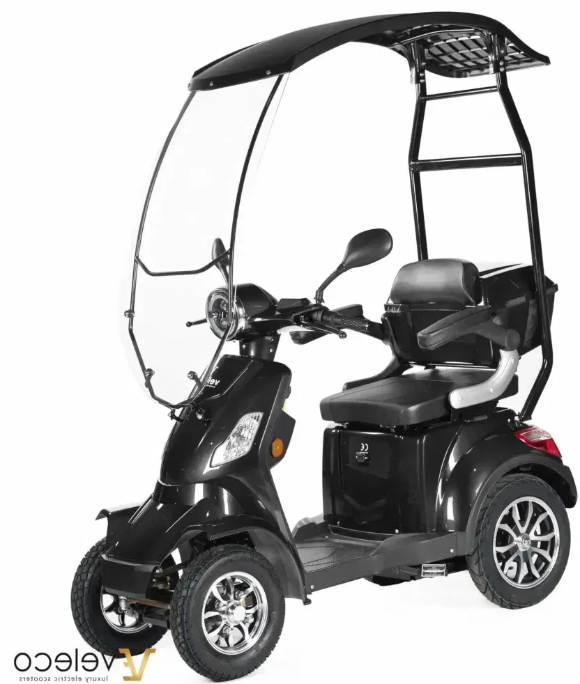 Scooter FASTER VELECO noir avec toit et pare-brise  : Puissant, sécurisé et homologué pour la route. Idéal pour la mobilité réduite