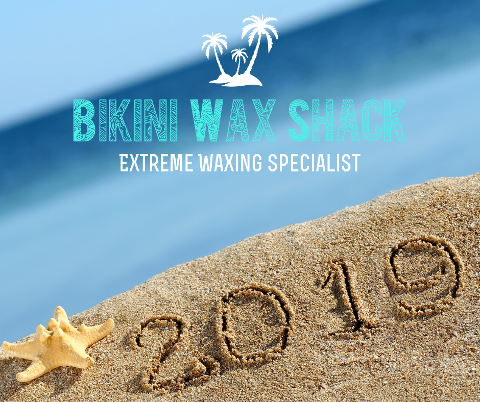Beach with 2019 written in the sand