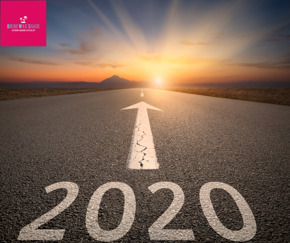 road to a sunset with 2020 and an arrow white line