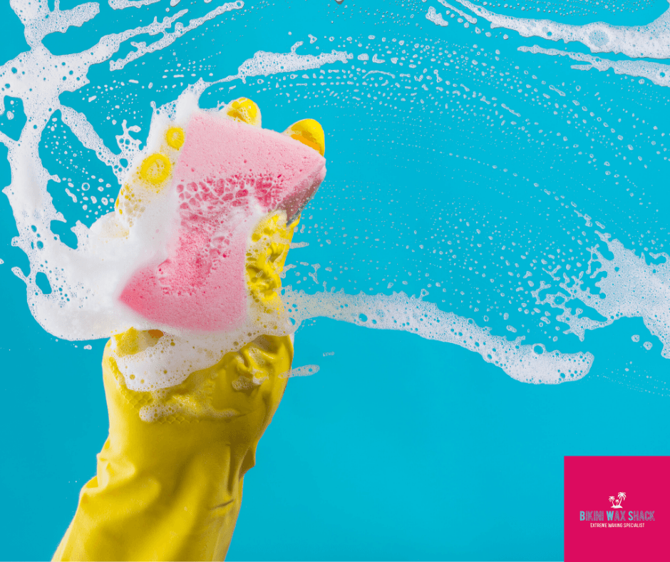 Bikini Wax Shack - Wet sponge cleaning glass