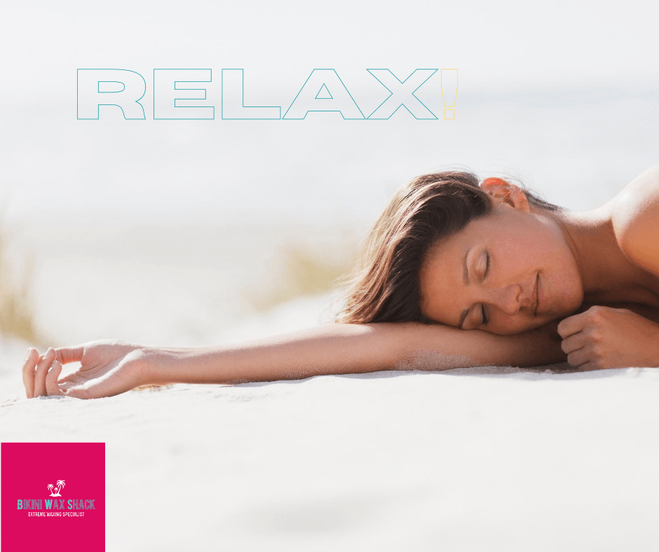 Woman sleeping on a beach with the slogan relax!