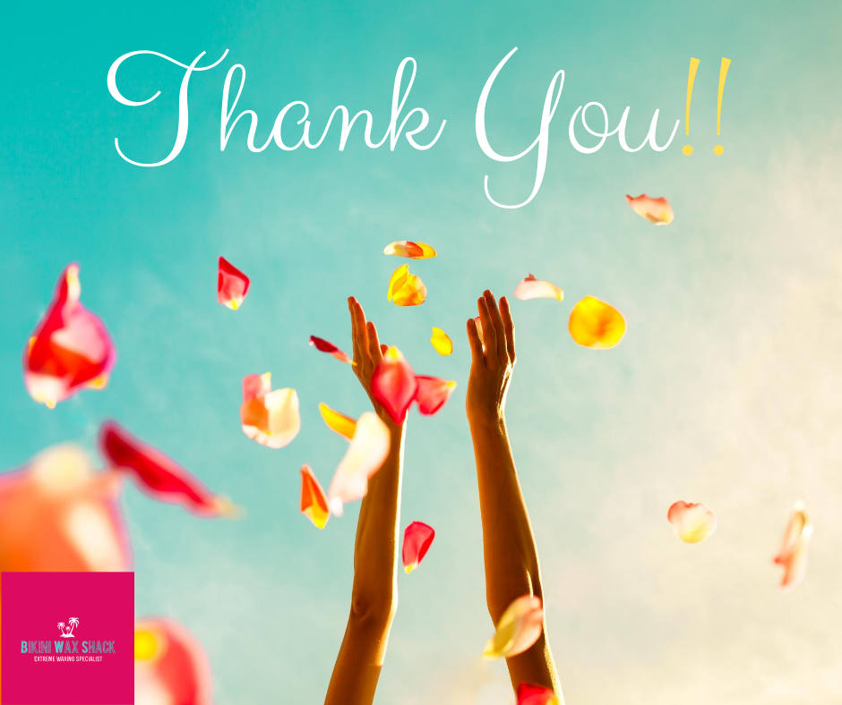 Arms up in the air throwing flower petals with the slogan thank you