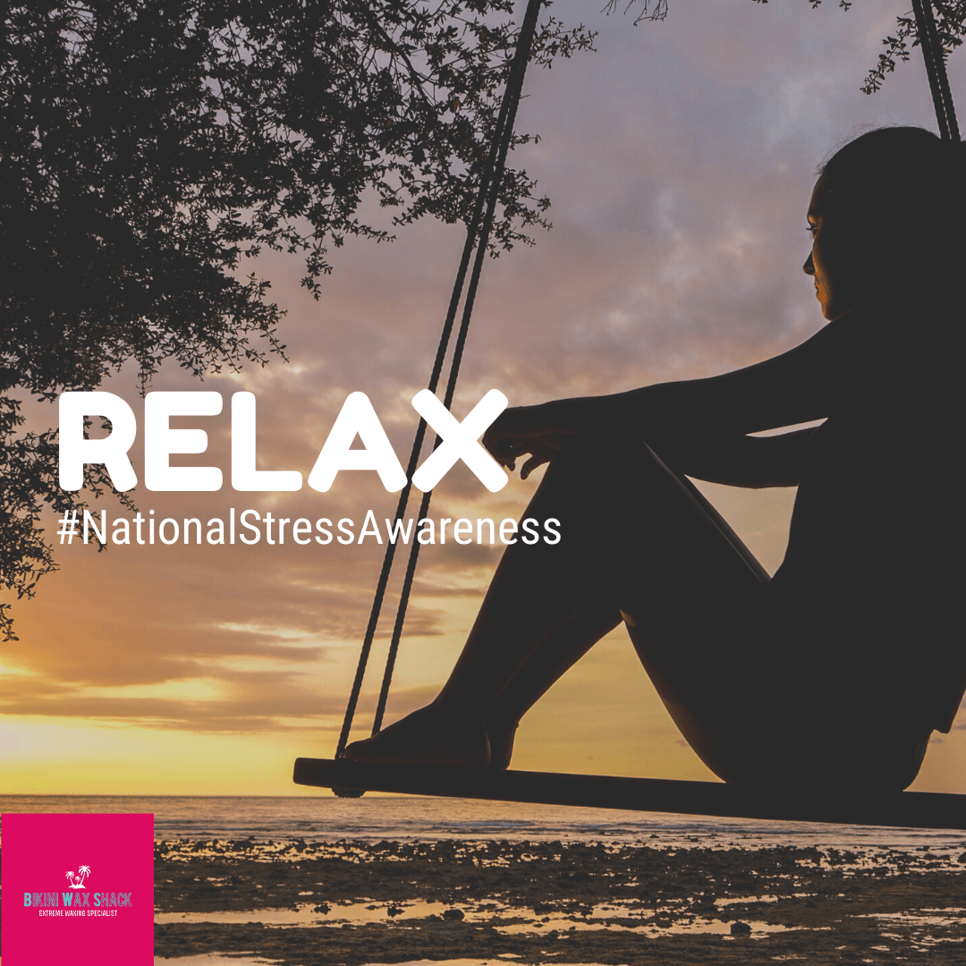 Woman sat on a swing on the beach staring out to sea, the slogan reads Relax with the hash tag nationalstressawareness