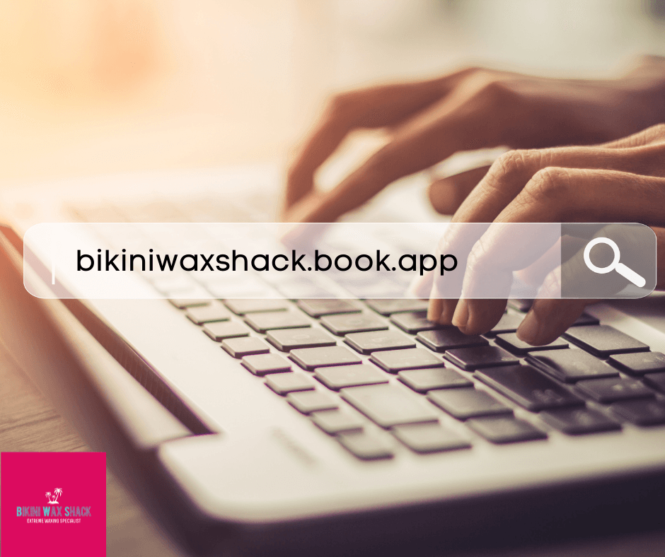 Typing on a laptop bikiniwaxshack.book.app