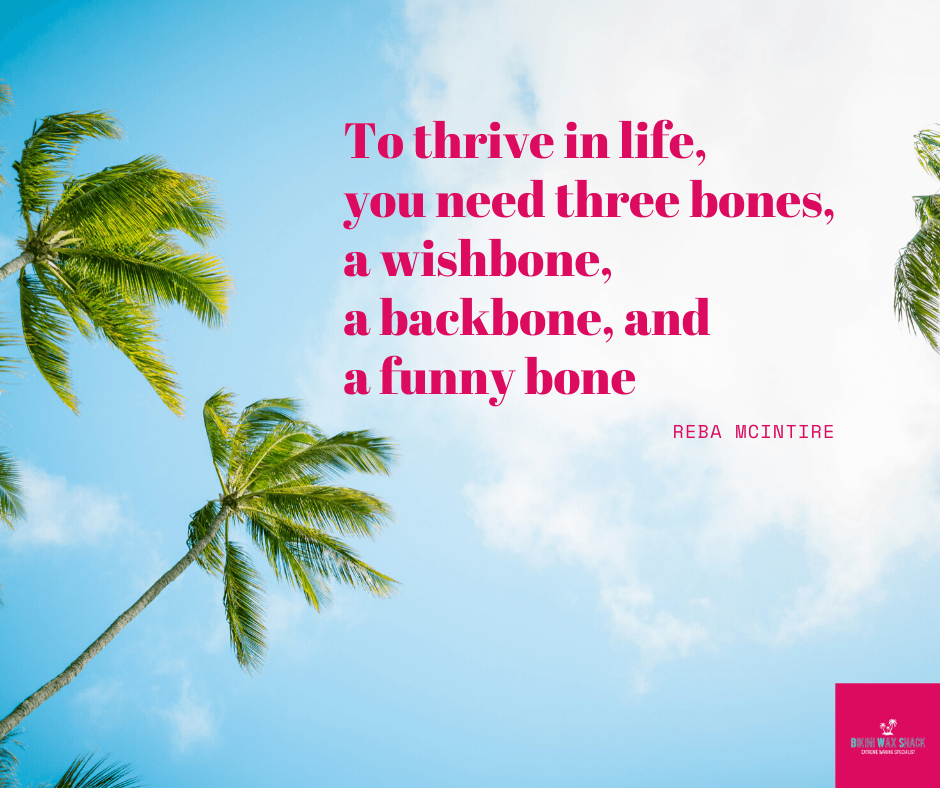 thrive in life quote on palm leaves background