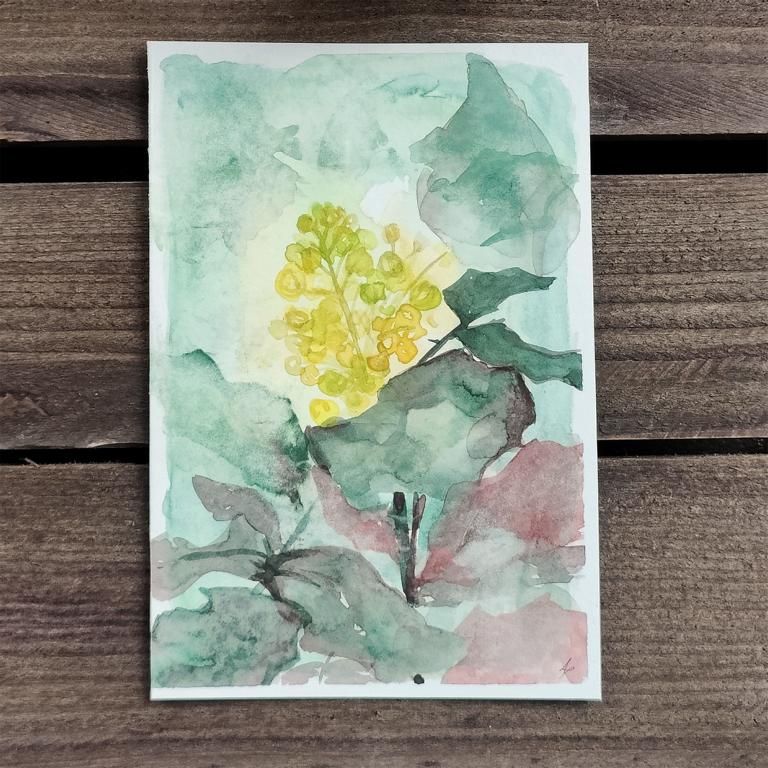 Angie Teickner: Baumkerze in Gelb zwischen grünen zarten Blättern