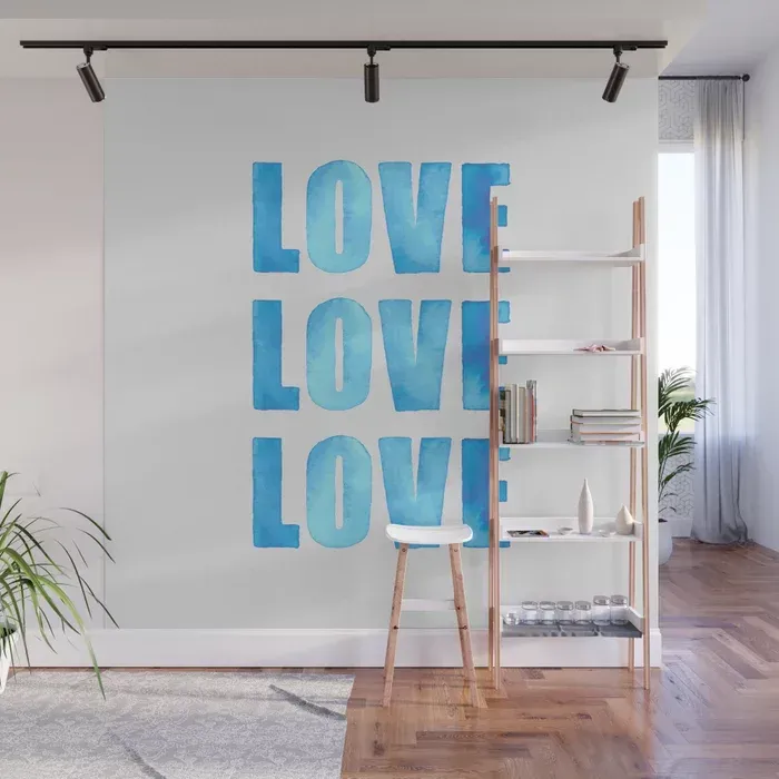 large-scale mural with hand-painted watercolor letters, spelling out Love Love Love