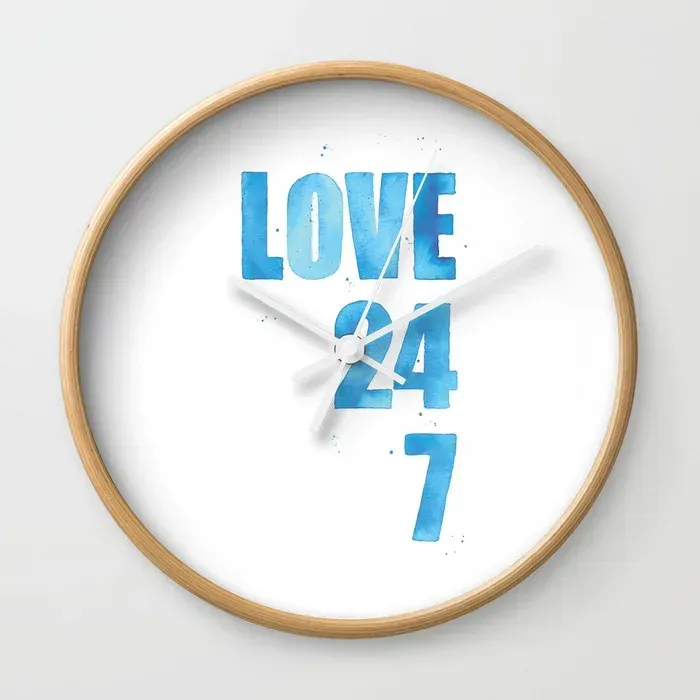 picture of a wall clock with a watercolor lettering design, reading love 24,7 in blue letters and numbers