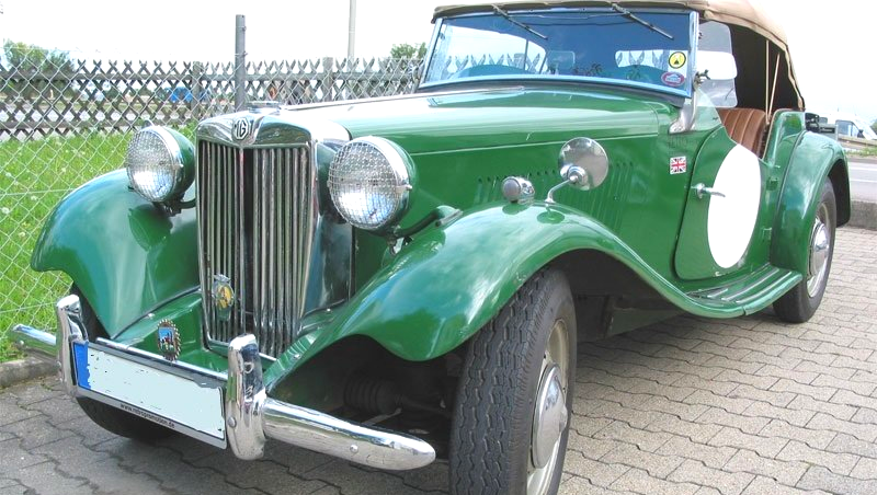Von 1936 bis 1955 wurde dieses MG Modell gebaut. Der Roadster hat noch die klassische Vorkriegstechnik, die für den Fahrer einer gewissen Eingewöhnung bedarf. MG Oldtimer mieten