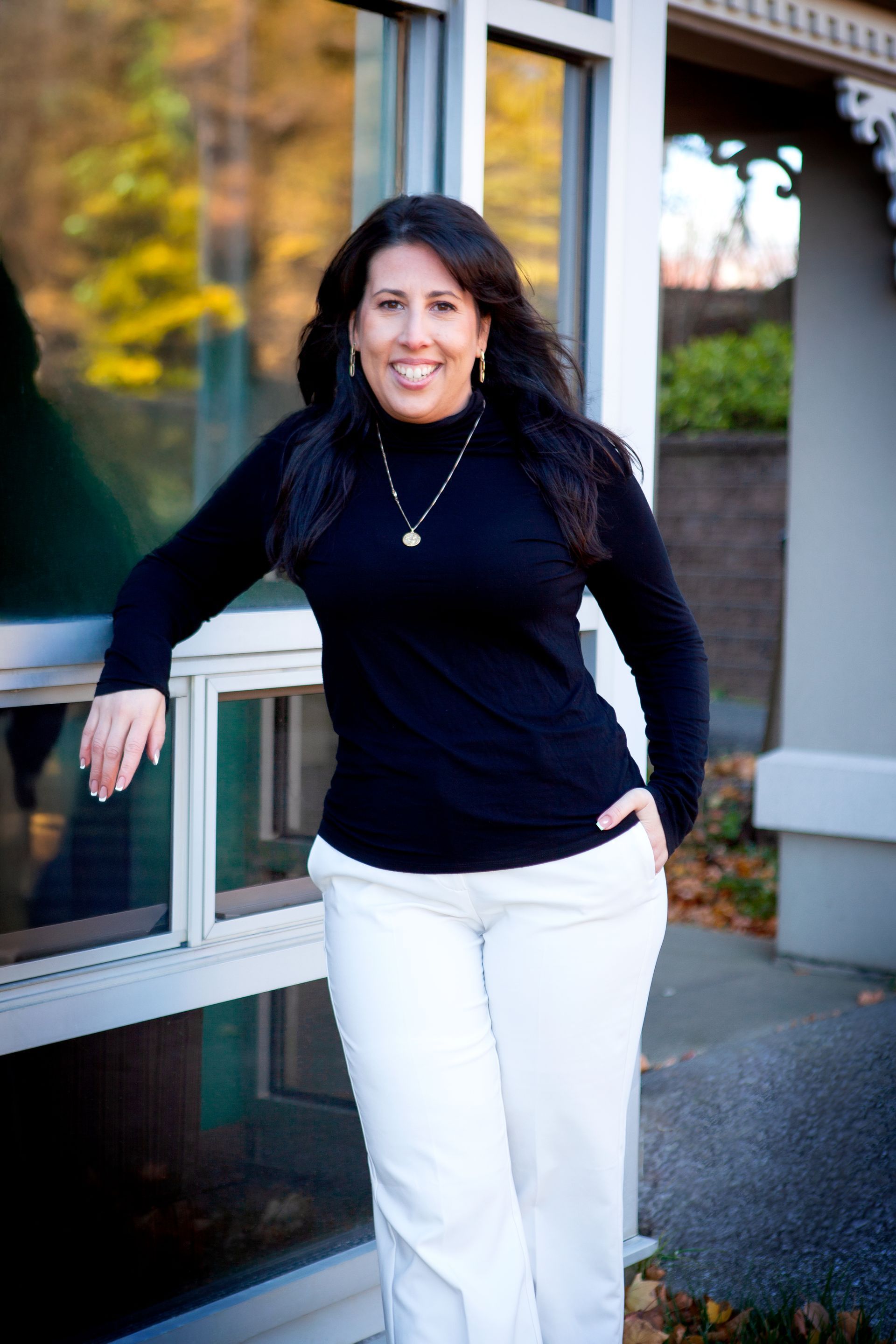 Daniela standing outside the building at FullForce Legal Services