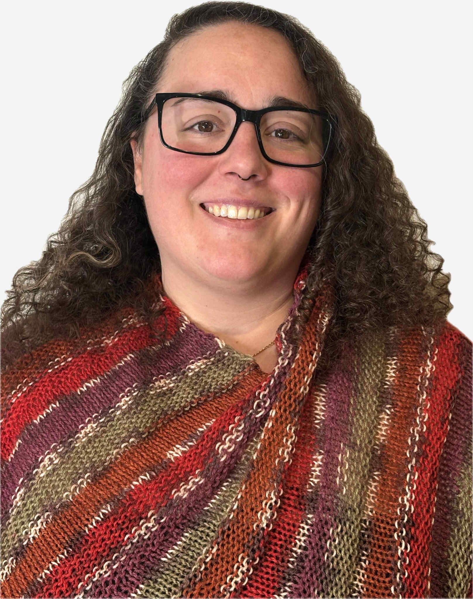 Rodney Jackson Sitting in a chair in his office smiling