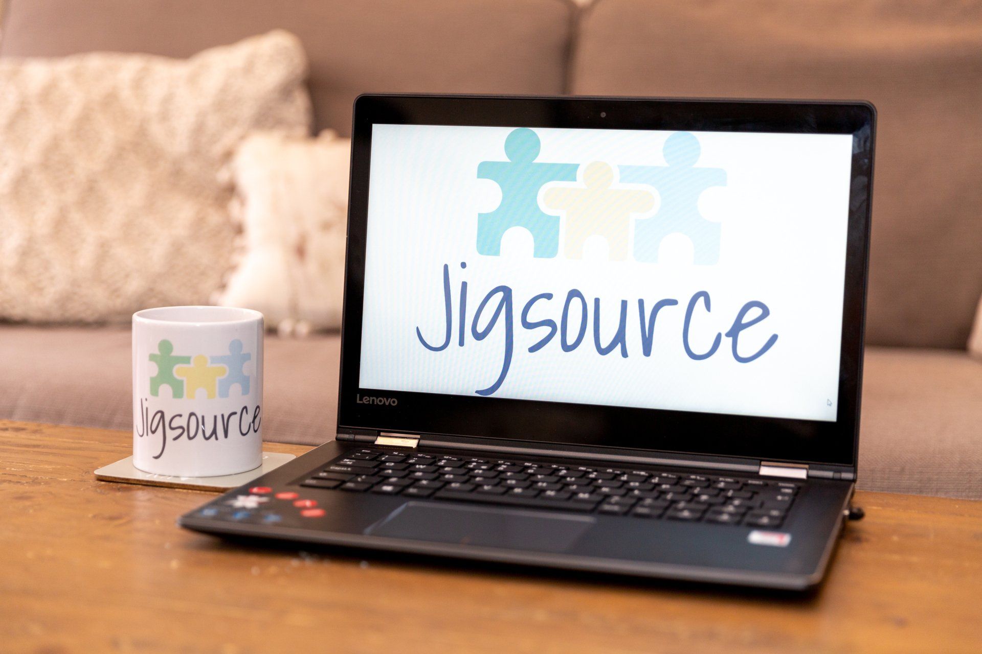 laptop with jigsource logo