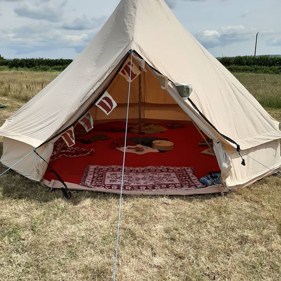 Working on a shamans tent on the land