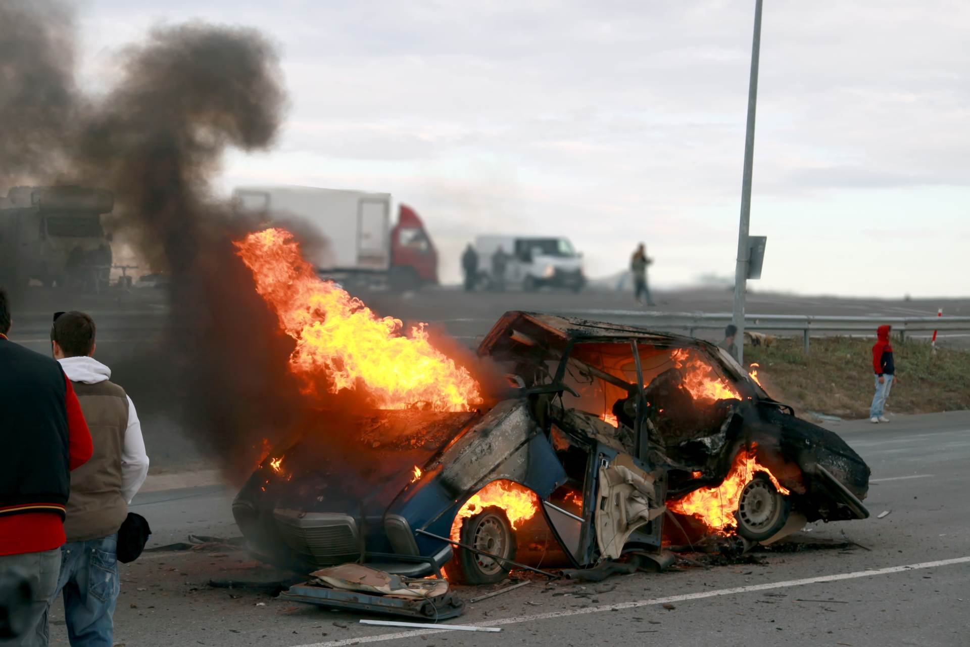 vehicle wreckage and fire