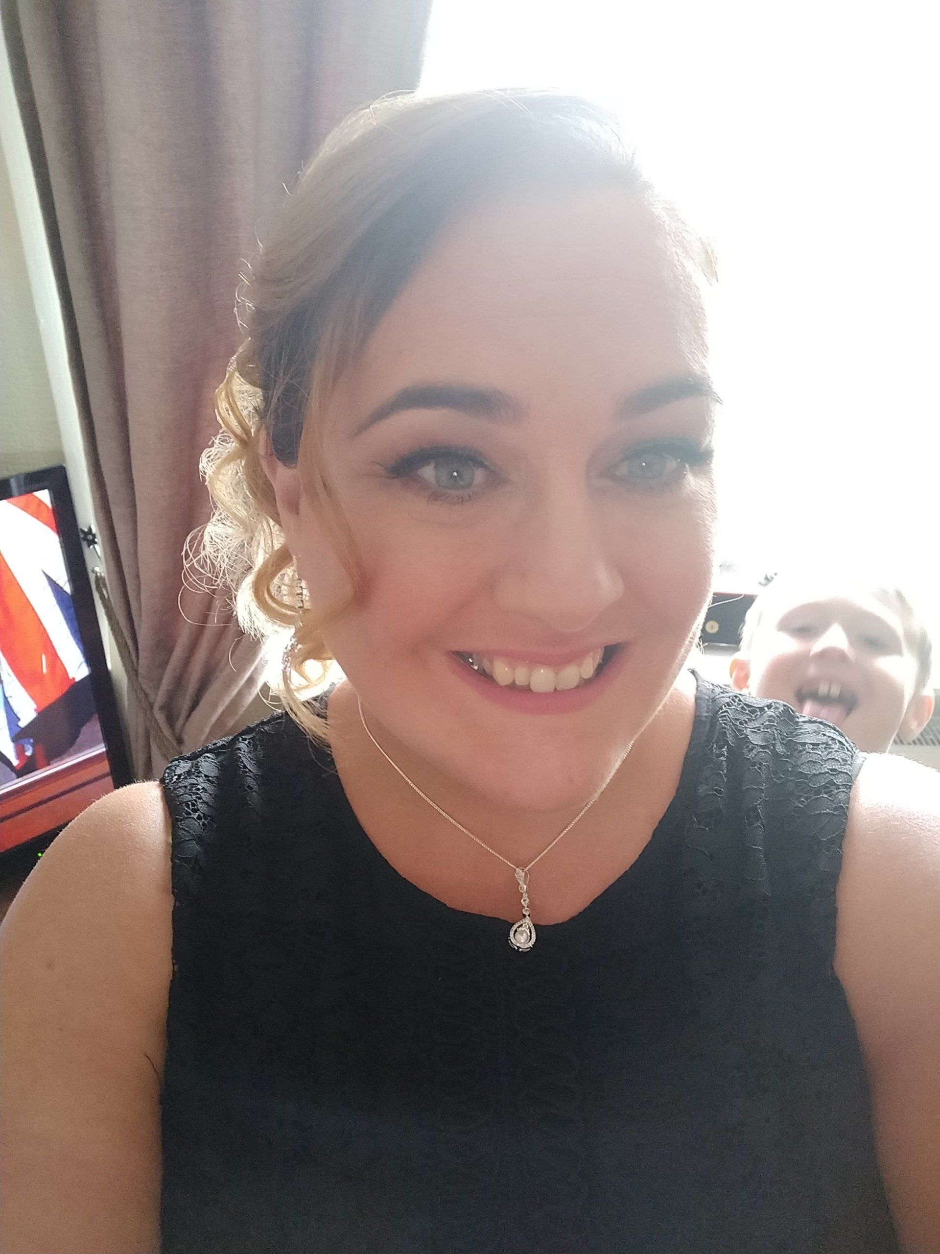 Kerri with make up on for her award