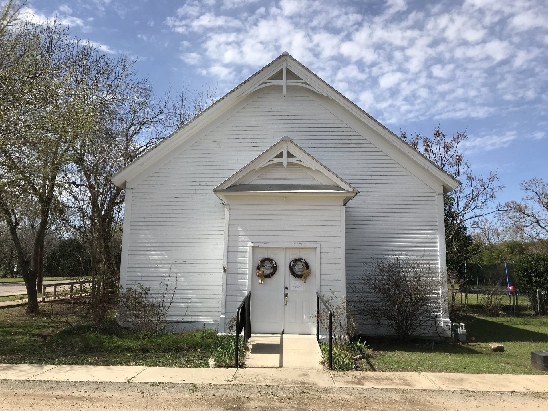 front door of Center Point Christian church, a small white frame victorian-era straight building