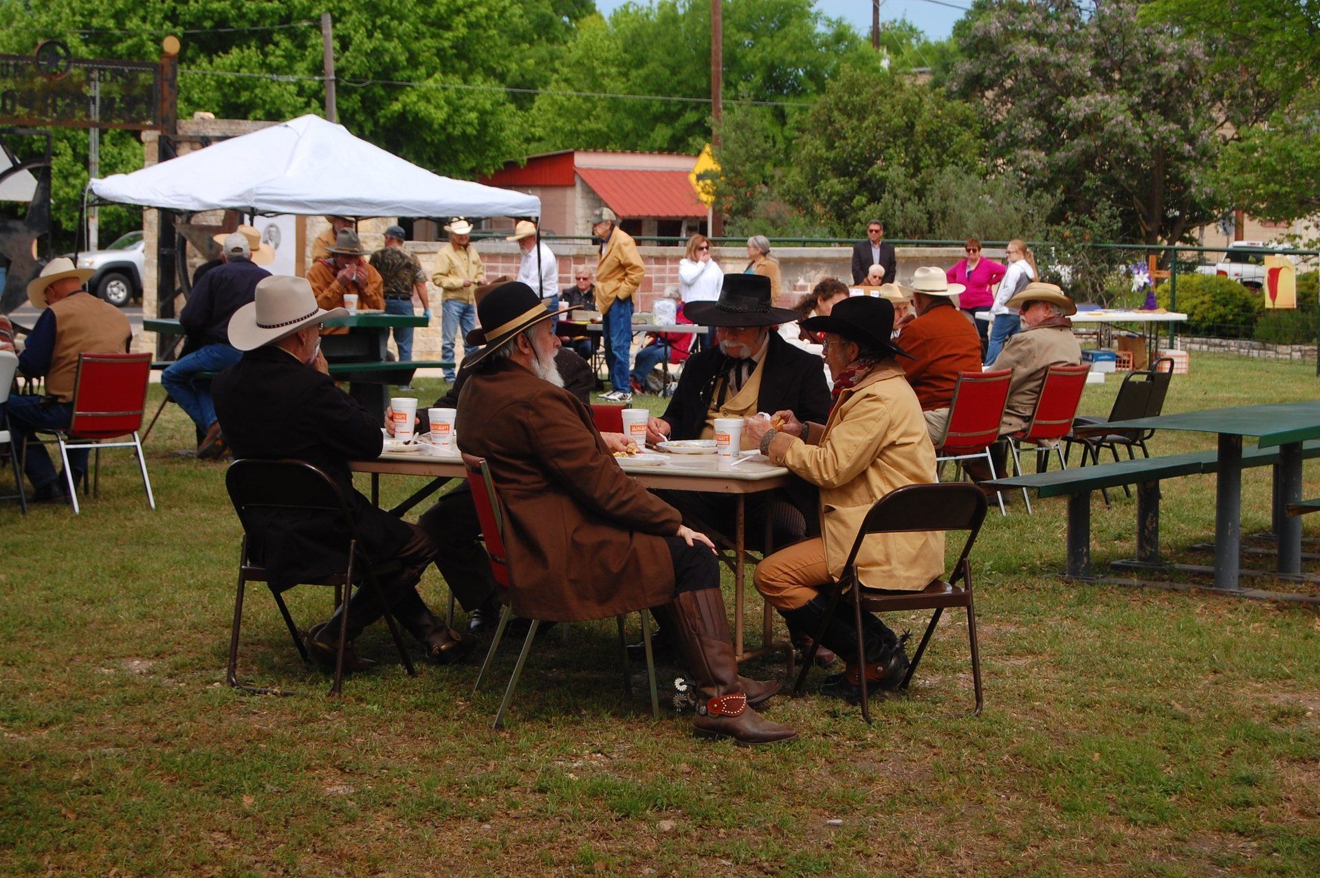 former Texas Rangers in period costume eat barbeque, too!