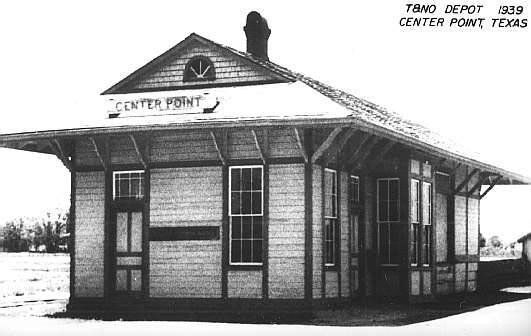 old photo of the Center Point depot with a sign  reading 'Center Point'