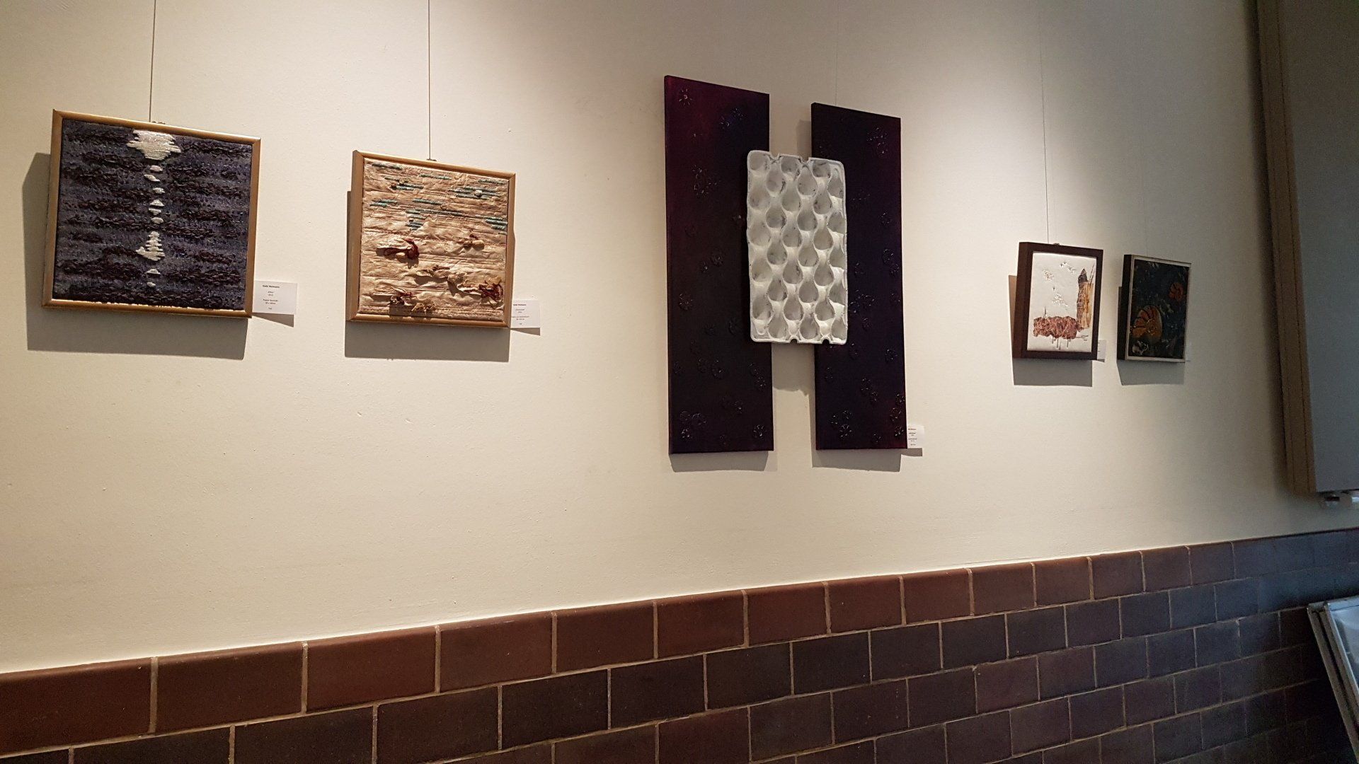 vier kleine textile Arbeiten von Gabi Heimann im