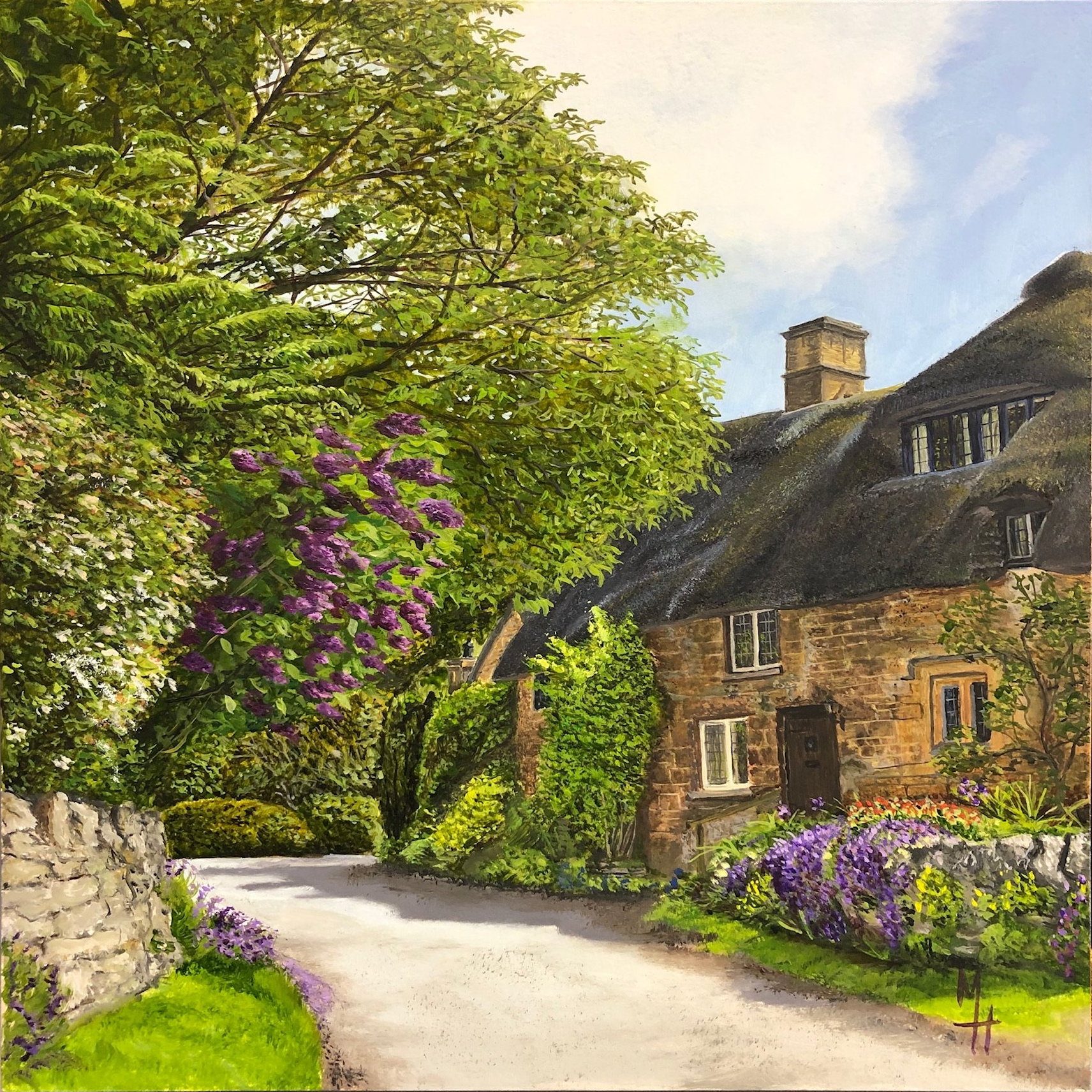 Picturesque English country thatched cottage in a quiet lane