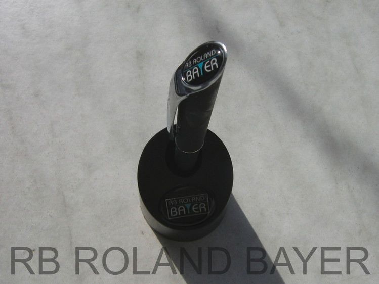Logo RB ROLAND BAYER