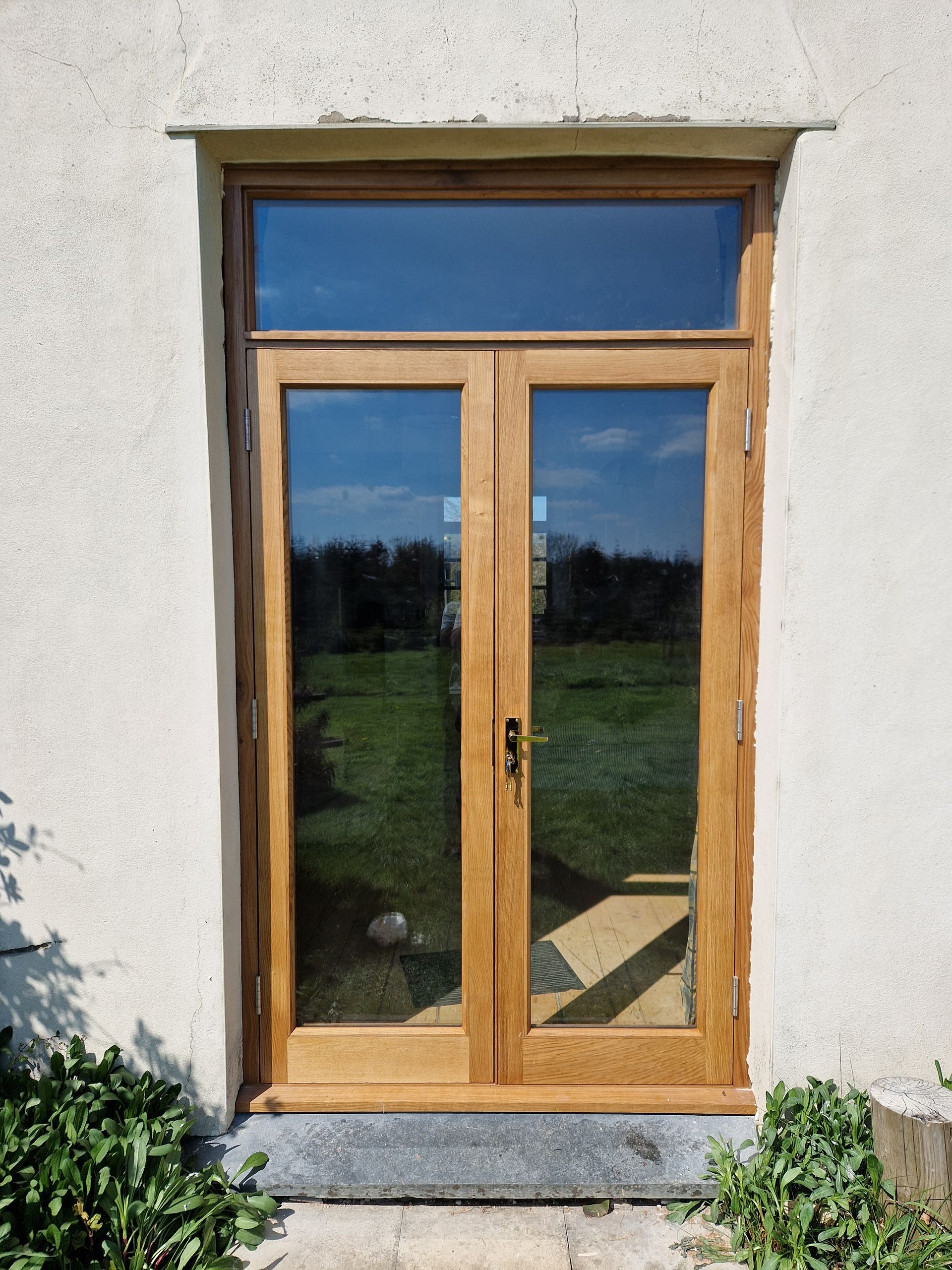 European Prime Oak French doors and frame double glazed with glazed top light 
