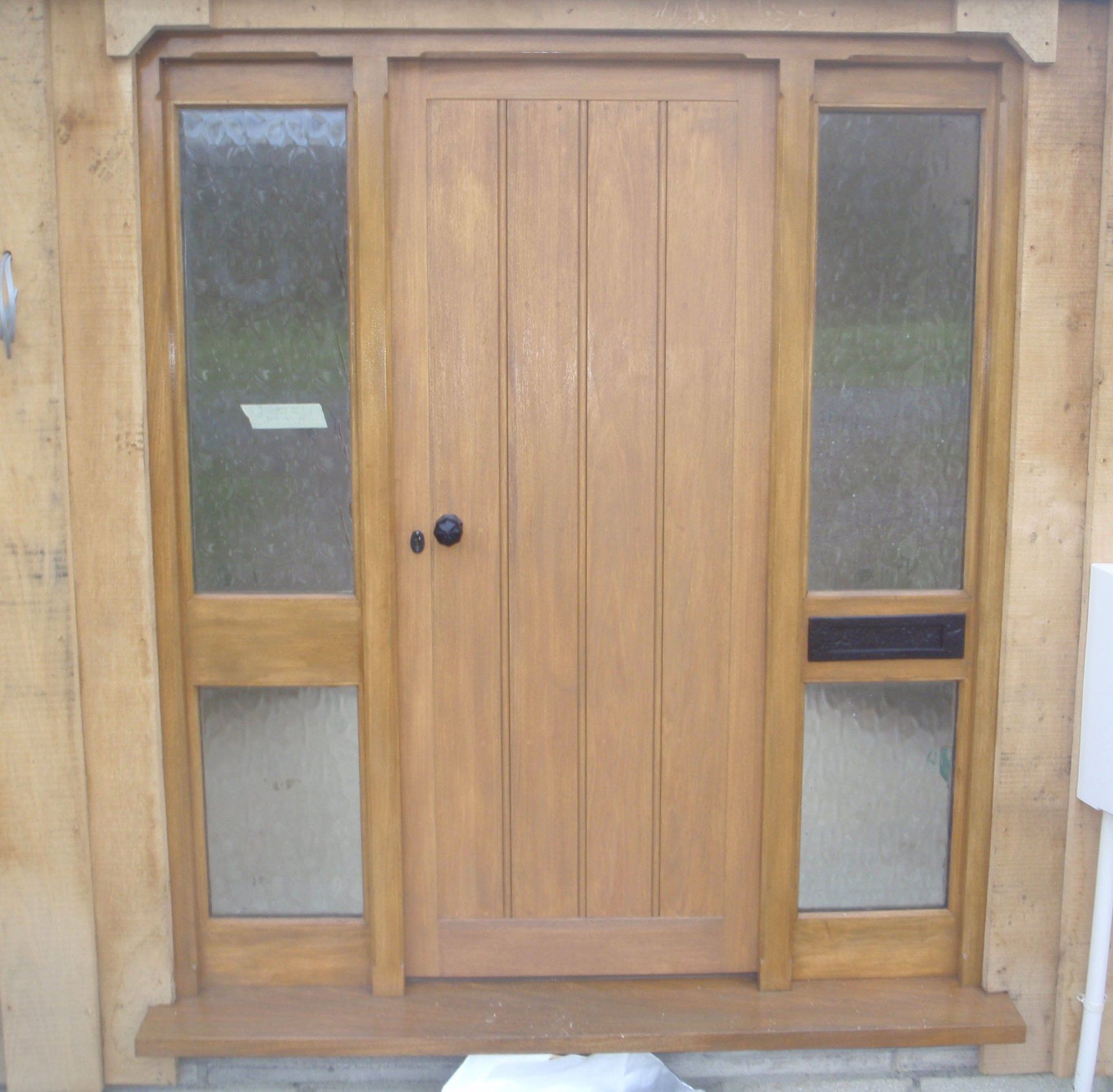 Idigbo door and frame with side lights
